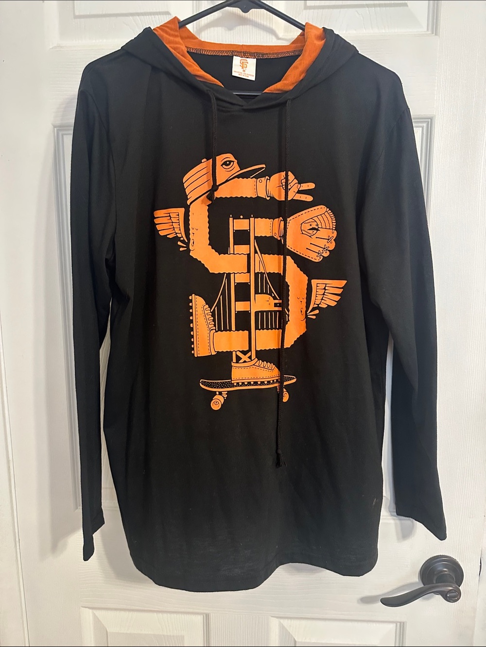 Black & Orange San Francisco Giants long sleeve hooded shirt. NWOT
